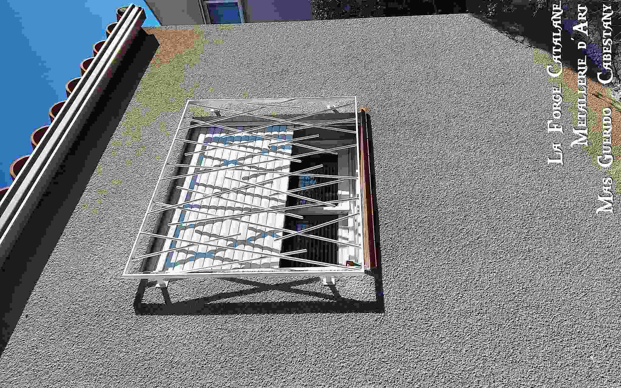 grille de protection remplissage barreaudage entremeles rond forge catalane.jpg